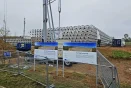 Construction of the spaceframe for Interleuven’s heating system at the Keiberg-Vossem business park, Tervuren, featuring a 1.5 million-litre water heat buffer and solar collectors