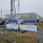 Construction of the spaceframe for Interleuven’s heating system at the Keiberg-Vossem business park, Tervuren, featuring a 1.5 million-litre water heat buffer and solar collectors